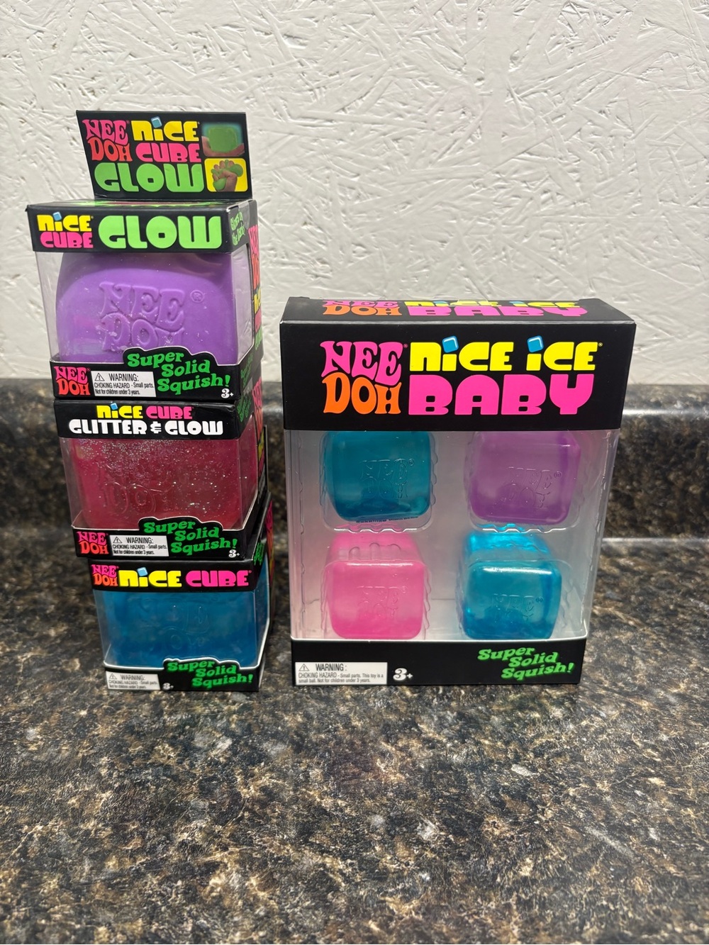 Needoh Lot. 4 Pack Nice Ice Baby, Nice Cube, Glitter & Glow, Glow.